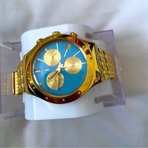 Swatch golden & blue open box never used.